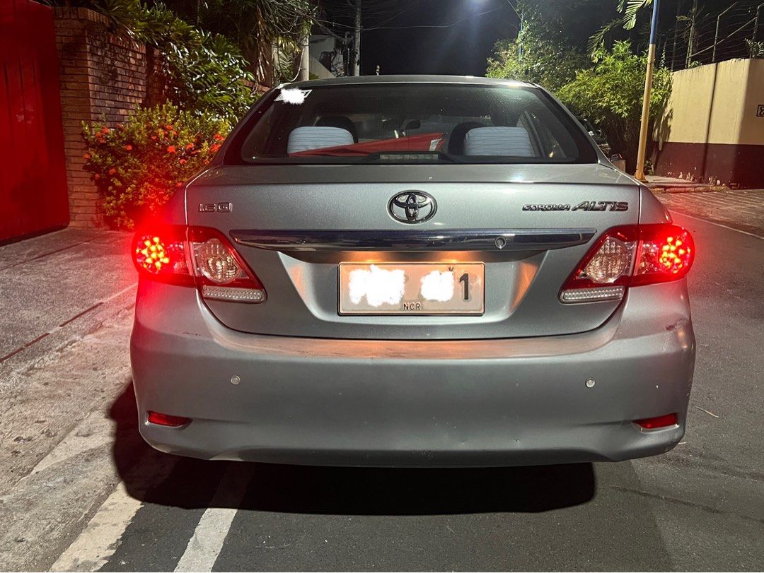Toyota Corolla Altis 1.6 (A) (Category: Used Cars) located in Mandaluyong City. Submitted by jayborino (Listing ID 1464875550, Image 1). Description: 2011 Toyota Corolla Altis 1.6G Automatic — ₱300,000 (As-is, where-is) • 1st owner, well-kept personal vehicle • 76,000 km / ~5,000 km/year • Silver, automatic, no mods • Smooth, solid engine & comfortable drive • Clean original OR/CR on hand • Registration updated for 2026 • Plate ending 1 (Monday c