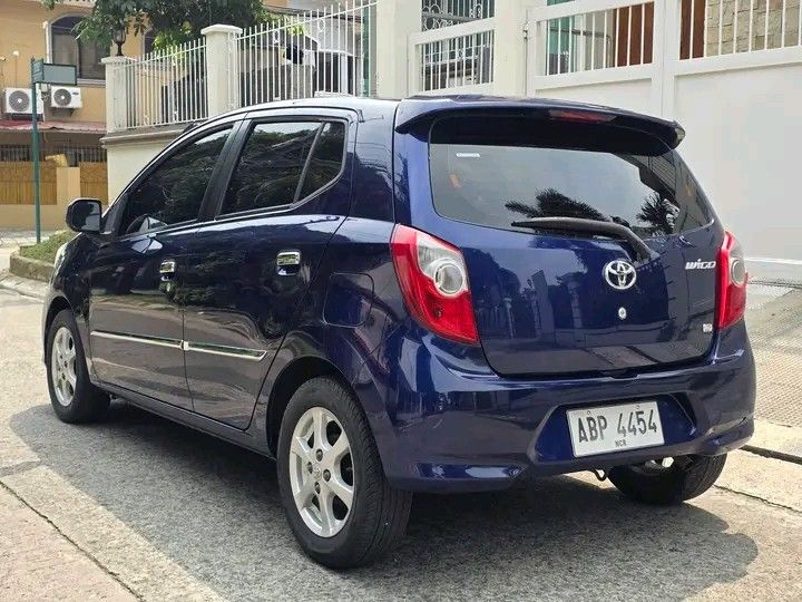 Toyota Wigo (Category: Used Cars) located in Manila. Submitted by lea2627 (Listing ID 1464902787, Image 3). Description: Low Budget Fresh Unit oh... Game na! Toyota Wigo G AT 2015 - Blue 71t kms odo 🔵 Financing Details 🔵 Downpayment: 75k 4yrs: 9,740 3yrs: 11,754 2yrs: 15,781 Php. 258k only! Still negotiable for cash basis ☺️ 1st owner Personal car Automatic Transmission No issues Well maintained engine Thick tires Cold Aircon Clean intact inter