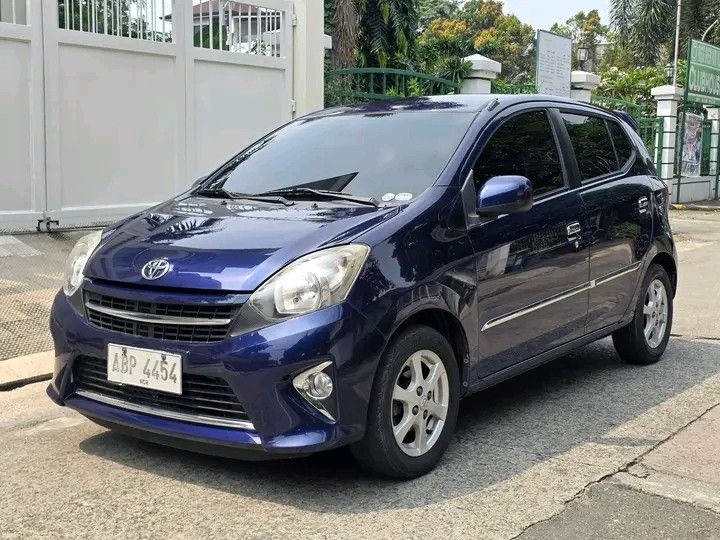 Toyota Wigo (Category: Used Cars) located in Manila. Submitted by lea2627 (Listing ID 1464902787, Image 2). Description: Low Budget Fresh Unit oh... Game na! Toyota Wigo G AT 2015 - Blue 71t kms odo 🔵 Financing Details 🔵 Downpayment: 75k 4yrs: 9,740 3yrs: 11,754 2yrs: 15,781 Php. 258k only! Still negotiable for cash basis ☺️ 1st owner Personal car Automatic Transmission No issues Well maintained engine Thick tires Cold Aircon Clean intact inter