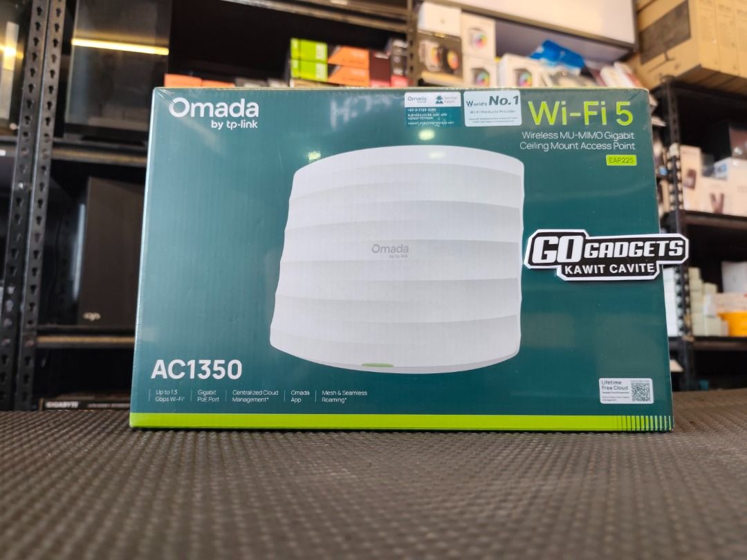 TP-Link Omada EAP225 AC1300 Wireless MU-MIMO Gigabit Ceiling Mount Access Point (Category: Networking) located in Cavite. Submitted by jerickher83429 (Listing ID 1464869619, Image 1). Description: TP-Link Omada EAP225 wireless ceiling mount access point. AC1300 speed with MU-MIMO technology and gigabit port. Centralized cloud management via Omada app. Supports mesh and seamless roaming. Unopened packaging box shown in the photo..