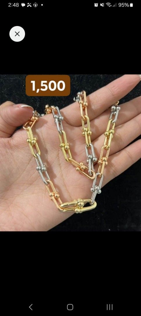 Tricolor hardware necklace (Category: Necklaces) located in Pasig City. Submitted by carlosaini41 (Listing ID 1464824090, Image 1). Description: - Trendy tricolor hardware necklace design - Features a combination of gold, silver, and rose gold link chains - Versatile accessory that easily matches any outfit or other jewelry pieces - Stainless steel -Non tarnish -18 inches.