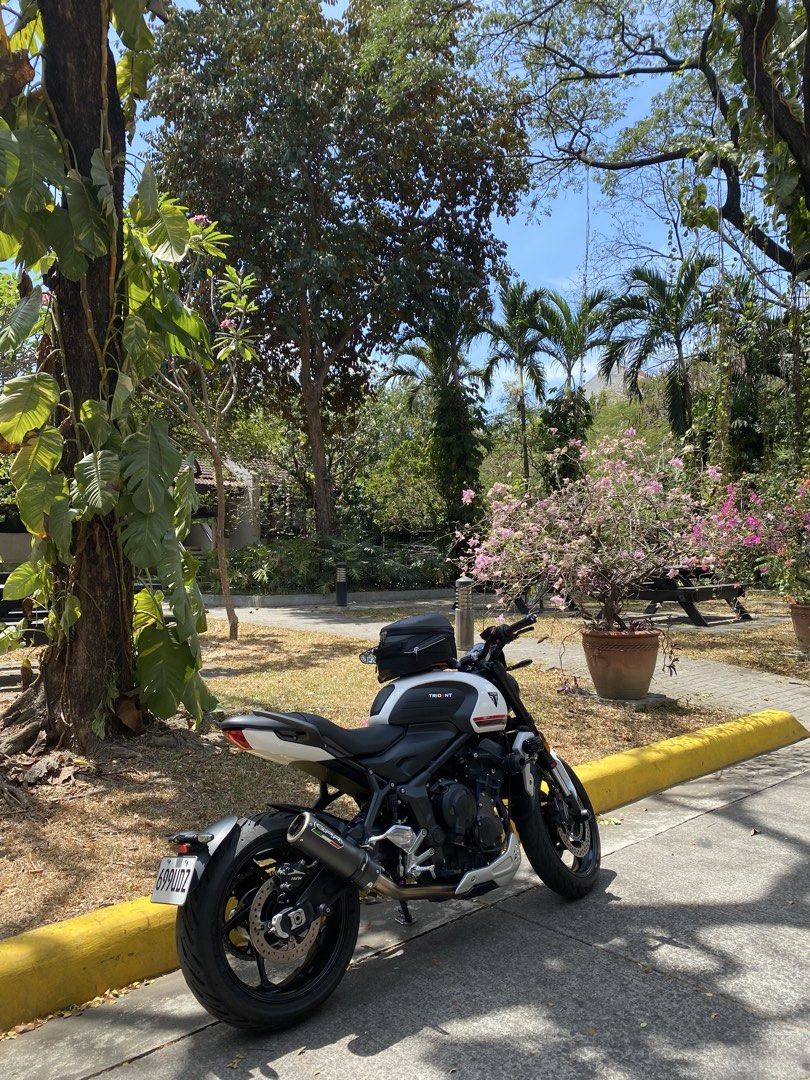 Triumph Trident + 180k worth accessories (Category: Motorbikes for Sale) located in Manila. Submitted by olxph_648008080 (Listing ID 1464948411, Image 2). Description: Triumph Trident naked bike, white and black colorway. GPR carbon fiber exhaust installed. Clean condition, washed and ready to ride. Small tank bag included for daily storage. Rides smooth on streets and highways. Great handling triple engine..