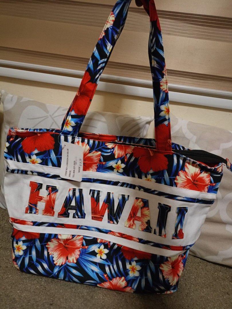 Tropical Floral Canvas Tote Bag (Category: Tote Bags) located in Valenzuela. Submitted by One.Only.Nan (Listing ID 1464923217, Image 1). Description: Get ready for your next vacation or beach day with this beautiful, brand-new Hawaii Tropical Floral Beach Tote Bag. It features a vibrant, colorful hibiscus print with a bold "HAWAII" text block across the front. Perfect for the pool, beach, cruises, or everyday summer shopping! • Condition: Brand N