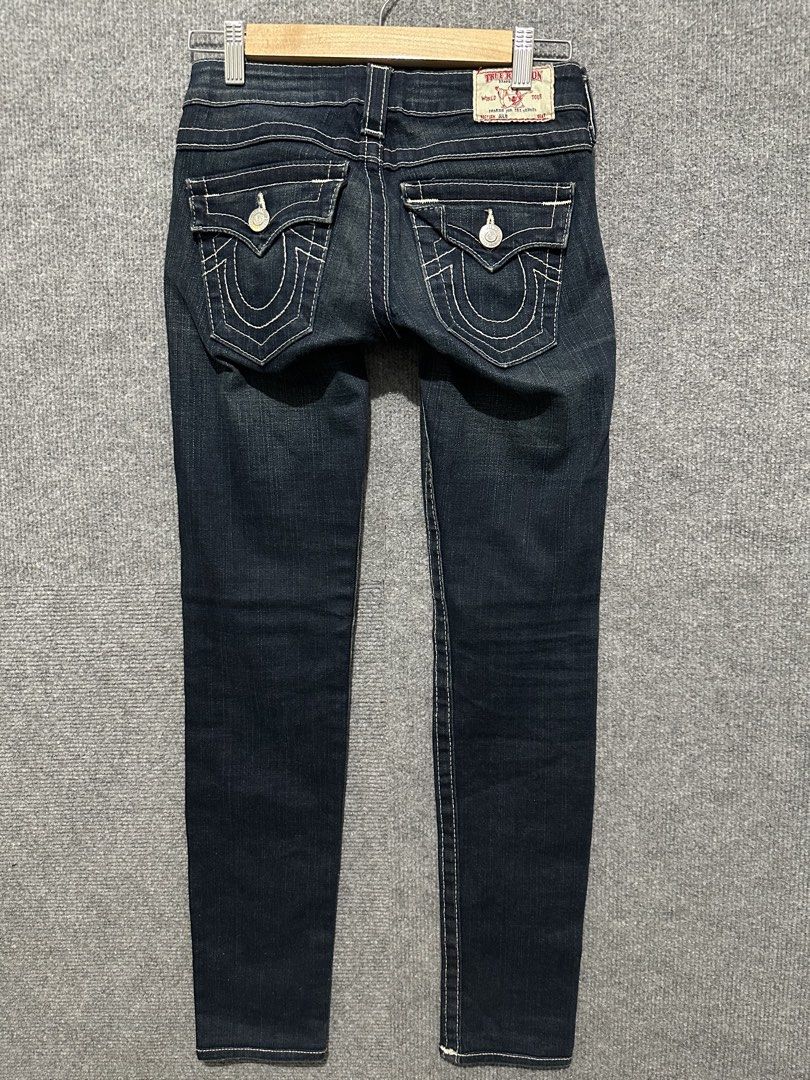 True Religion Julie Section Jeans Size 24 (Category: Jeans) located in Villasis. Submitted by justinramosonfb (Listing ID 1464871778, Image 2). Description: - Brand: True Religion - Style: Dark wash denim with iconic white contrast stitching - Details: Signature button flap back pockets with horseshoe design, front button and zipper closure - Origin: Made in USA - Size: 24 - Condition: Excellent pre-loved condition.