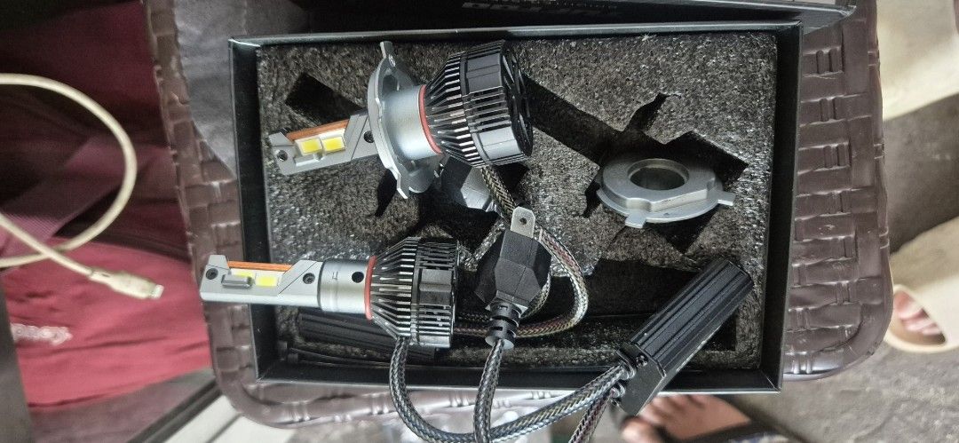 Tuffoo H4 75W LED Headlight Bulb Set (Category: Lightings, Horns, and other Electrical Parts and Accessories) located in Manila. Submitted by ajohnwill (Listing ID 1464912470, Image 1). Description: - Brand: Tuffoo LED Headlight Bulbs - Socket Type: H4 - Power Output: 75W - Color Temperature: 4300K Warm White - Condition: Brand new, never installed (bought as extra) - Inclusion: 2 bulbs, built-in cooling fans, wiring harness, drivers, and extra m