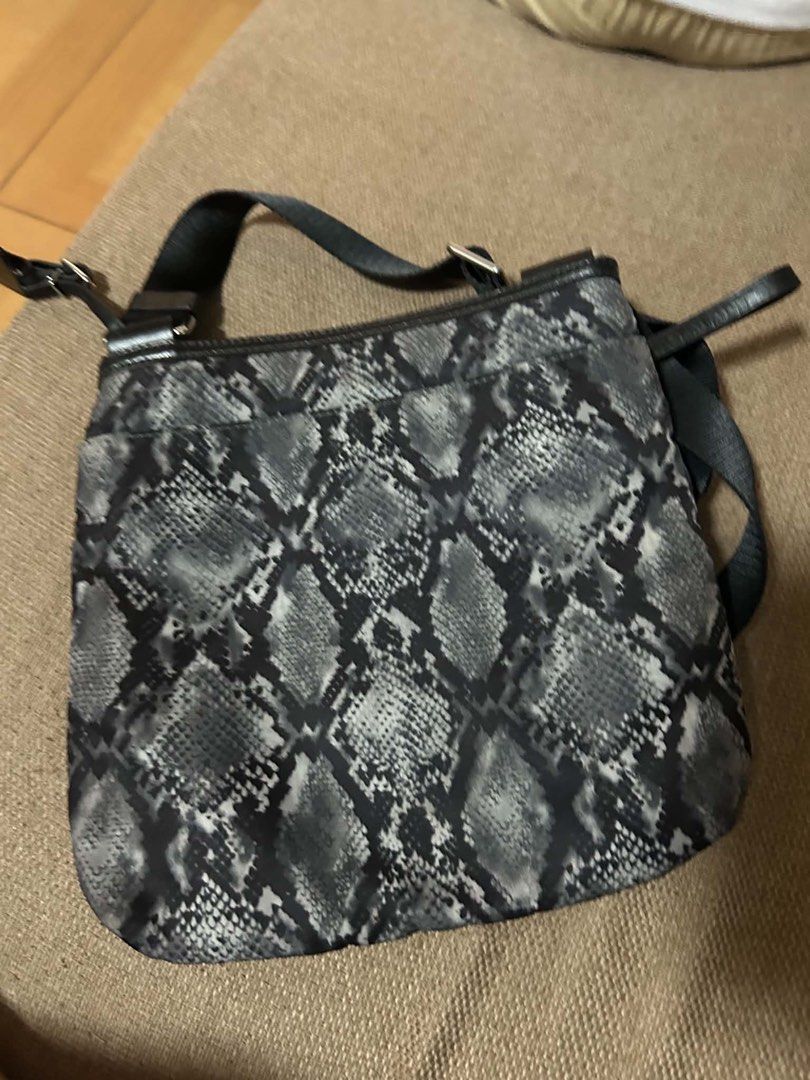 Tumi Snake Skin (Category: Sling Bags) located in Manila. Submitted by thriftniyuno (Listing ID 1464856040, Image 2). Description: Good as new.