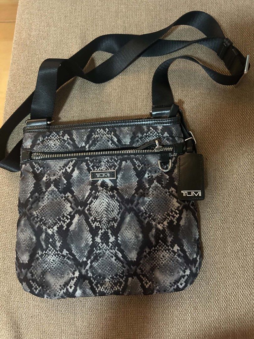 Tumi Snake Skin (Category: Sling Bags) located in Manila. Submitted by thriftniyuno (Listing ID 1464856040, Image 1). Description: Good as new.