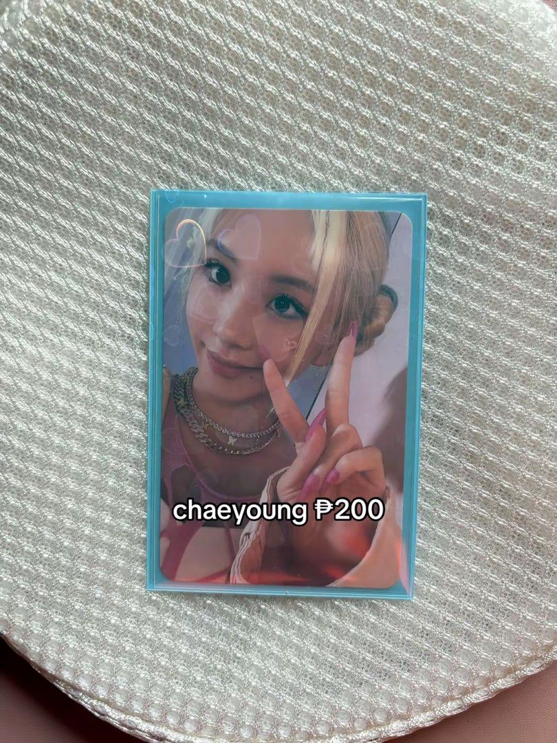 TWICE Chaeyoung Official Photocard (Category: K-Wave Merchandise) located in Cavite. Submitted by marissa0_0 (Listing ID 1464932083, Image 1). Description: - Member: Chaeyoung (TWICE) - Finish: Holographic heart pattern overlay - Storage: Stored safely in a collection binder - Inclusions: Free clear protective sleeve included.