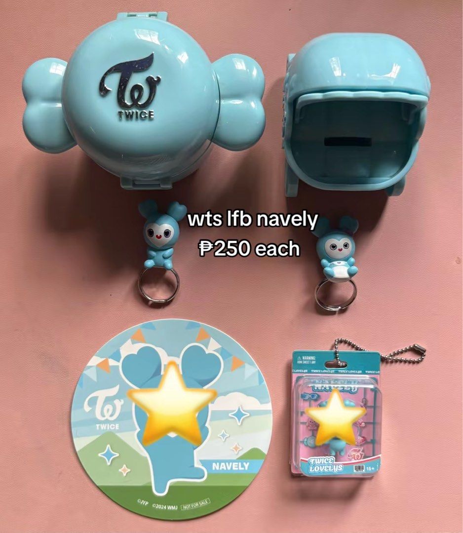 TWICE Navely Candy Bong and keychains set (Category: K-Wave Merchandise) located in Cavite. Submitted by marissa0_0 (Listing ID 1464932381, Image 1). Description: WTS Navely JYP Entertainment Merch - Price: P250 each - Color: Light blue scheme - Blue Candy Bong container included - Two Navely keyring figures - Round sticker sheet - Boxed miniature figure with chain.
