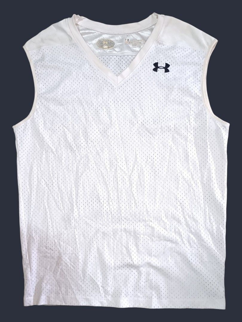 UNDER ARMOUR JERSEY (Category: Vests) located in Midsayap. Submitted by macoy.picker (Listing ID 1464815314, Image 1). Description: UNDER ARMOUR JERSEY mesh-style sleeveless athletic v-neck top Thrift Find 150 + SF.