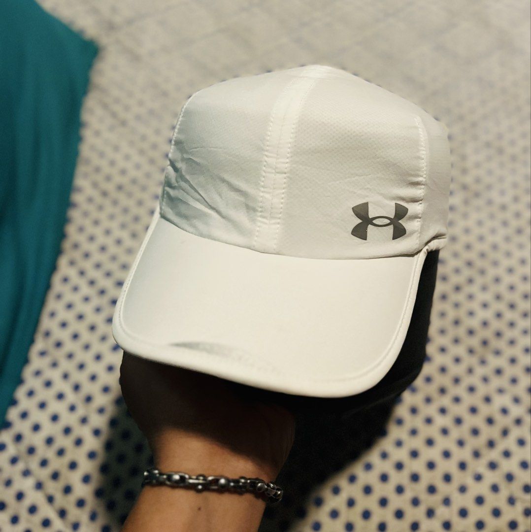 Under Armour Launch Running/Activewear Cap (Category: Caps & Hats) located in Navotas City. Submitted by y2kikaystuff (Listing ID 1464948717, Image 1). Description: Under Armour Launch Running/Activewear Cap Adult Size One Size Fits All Strapback(Adjustable) Used thrice Personal item Bought for 1799 Php No issue Need wash only 500 only Pm me.
