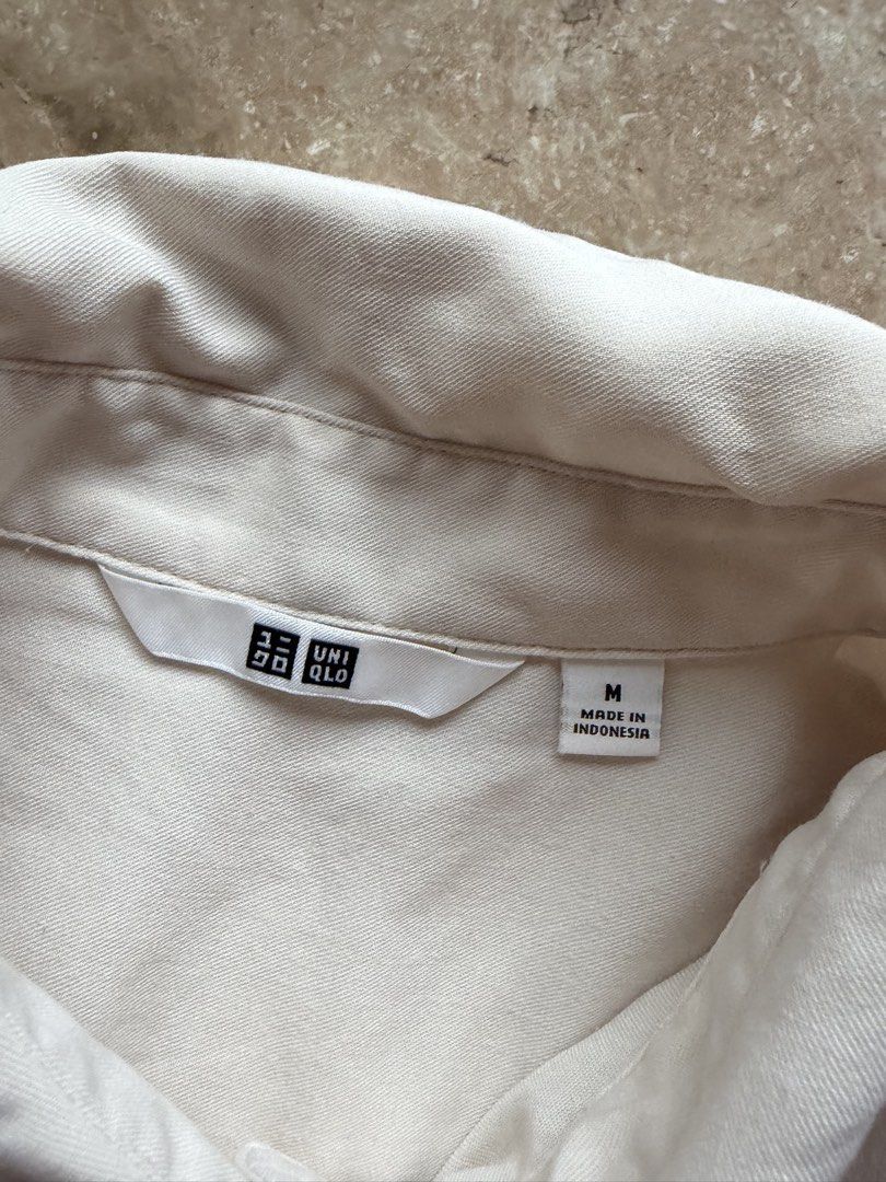 Uniqlo Cream Button-Up Blouse (Category: Longsleeves) located in Quezon City. Submitted by tidyup.lara (Listing ID 1464863359, Image 3). Description: Size M Shoulder 16” Bust 38” Waist 40” Length 26” Condition 8/10: used but in good condition .