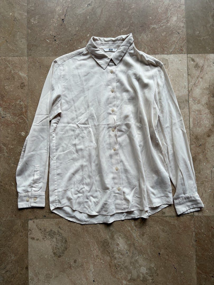 Uniqlo Cream Button-Up Blouse (Category: Longsleeves) located in Quezon City. Submitted by tidyup.lara (Listing ID 1464863359, Image 1). Description: Size M Shoulder 16” Bust 38” Waist 40” Length 26” Condition 8/10: used but in good condition .