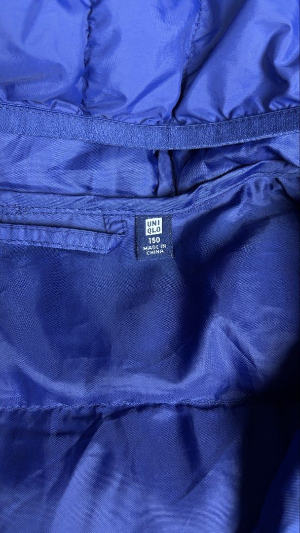 Uniqlo Blue Hooded Puffer Jacket (Category: Coats, Jackets and Outerwear) located in Bacoor. Submitted by calvinmanzano13 (Listing ID 1464828481, Image 3). Description: - L = 22” | W = 19” - Can also fit to women - Closure: Full zip with pull tab - Design: Warm quilted pattern with lightweight feel - Safety feature: Reflective dots on lower back Notes: ☑️ Hand washed ☑️ Polished ☑️ Steam ironed.