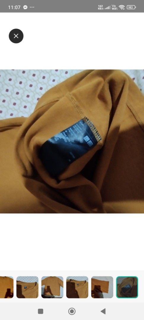Uniqlo Mustard Yellow Crew Neck (Category: Shirts) located in Manila. Submitted by lene48 (Listing ID 1464832274, Image 3). Description: - Brand/Model: Uniqlo - Color: Mustard yellow - Size: Medium (tag on collar)but can fit to xl - Material: 100% cotton - Style: Crew neck, short sleeves, solid pullover - Condition: Clean, well-maintained fabric with standard ribbed neckline - Perfect for daily casual wear.