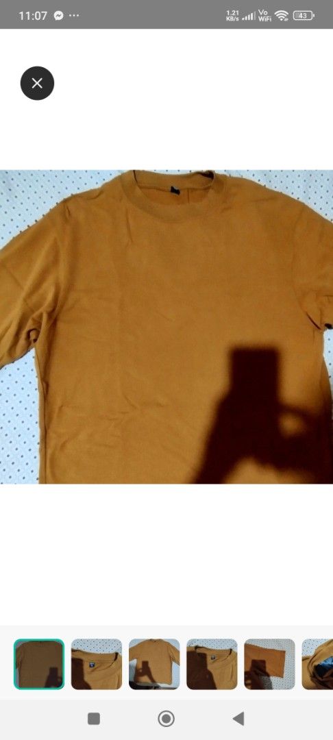 Uniqlo Mustard Yellow Crew Neck (Category: Shirts) located in Manila. Submitted by lene48 (Listing ID 1464832274, Image 2). Description: - Brand/Model: Uniqlo - Color: Mustard yellow - Size: Medium (tag on collar)but can fit to xl - Material: 100% cotton - Style: Crew neck, short sleeves, solid pullover - Condition: Clean, well-maintained fabric with standard ribbed neckline - Perfect for daily casual wear.