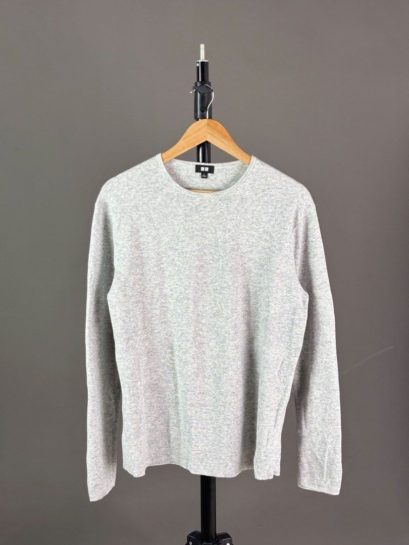 Uniqlo Crewneck Sweater L (Category: Coats, Jackets and Outerwear) located in Malilipot. Submitted by brevsthrift (Listing ID 1464880337, Image 1). Description: - Brand: Uniqlo - Color: Grey - Size: L - Material: Soft blend (polyester, acrylic, nylon, wool) - Measurements (Flat Lay): Width 21.5" | Length 27" - Details: Crew neckline, ribbed cuffs and hem - Origin: Made in Vietnam - Great for layering in cooler weather - Excellent condition Plus s