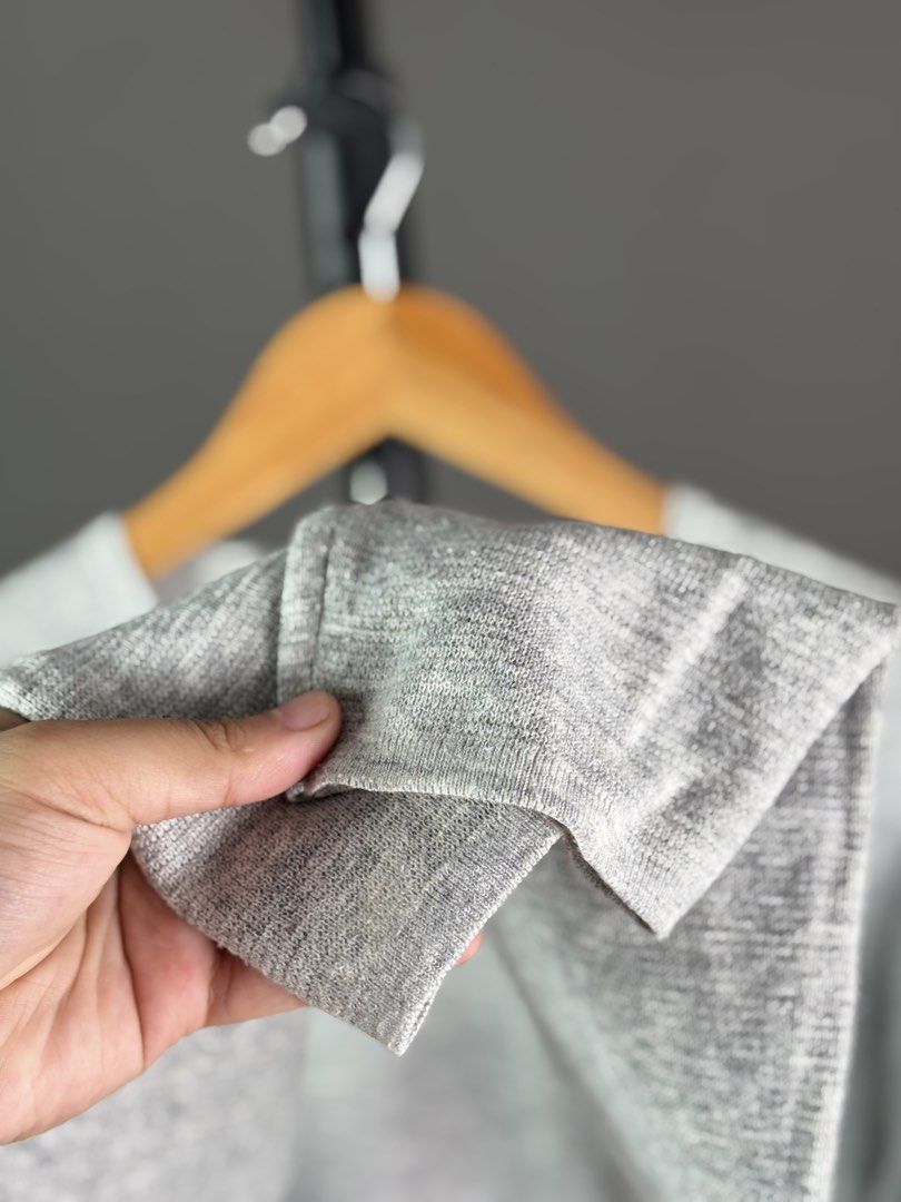 Uniqlo Crewneck Sweater L (Category: Coats, Jackets and Outerwear) located in Malilipot. Submitted by brevsthrift (Listing ID 1464880337, Image 3). Description: - Brand: Uniqlo - Color: Grey - Size: L - Material: Soft blend (polyester, acrylic, nylon, wool) - Measurements (Flat Lay): Width 21.5" | Length 27" - Details: Crew neckline, ribbed cuffs and hem - Origin: Made in Vietnam - Great for layering in cooler weather - Excellent condition Plus s