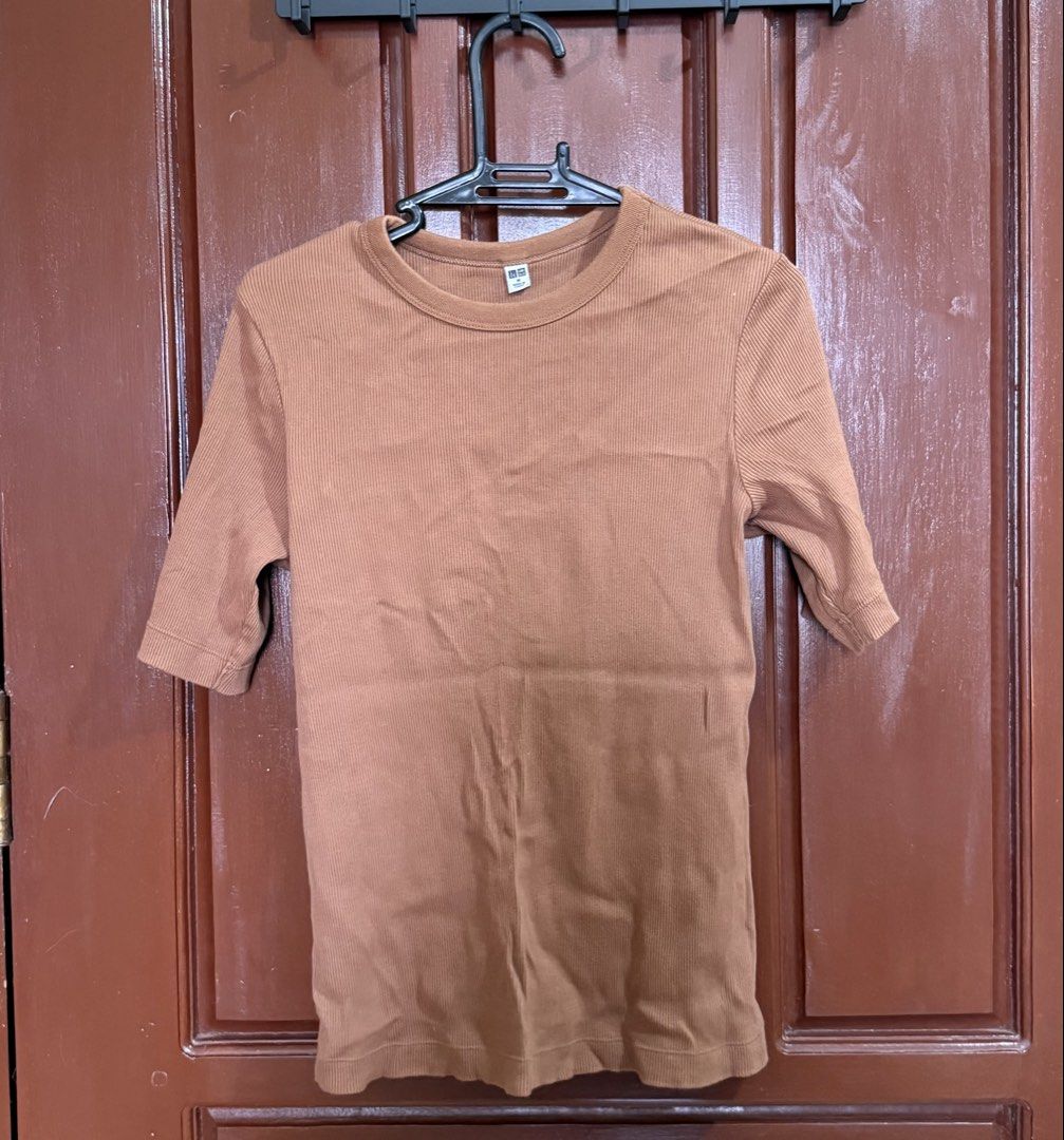 Uniqlo Ribbed Half Sleeve T-Shirts MEDIUM (Category: Shirts) located in Marikina City. Submitted by wearism (Listing ID 1464004165, Image 3). Description: 100% original Uniqlo. Slightly used. Not from UKAY. AVAILABLE UNTIL POSTED. Size: Medium (W12.5”xL17”) Color: Green (lighter shade) and brown (darker shade) Fit: Regular Where was it made: China Price is fixed. Php250.00 each No additional photos will be provided. No when worn photo. We will se