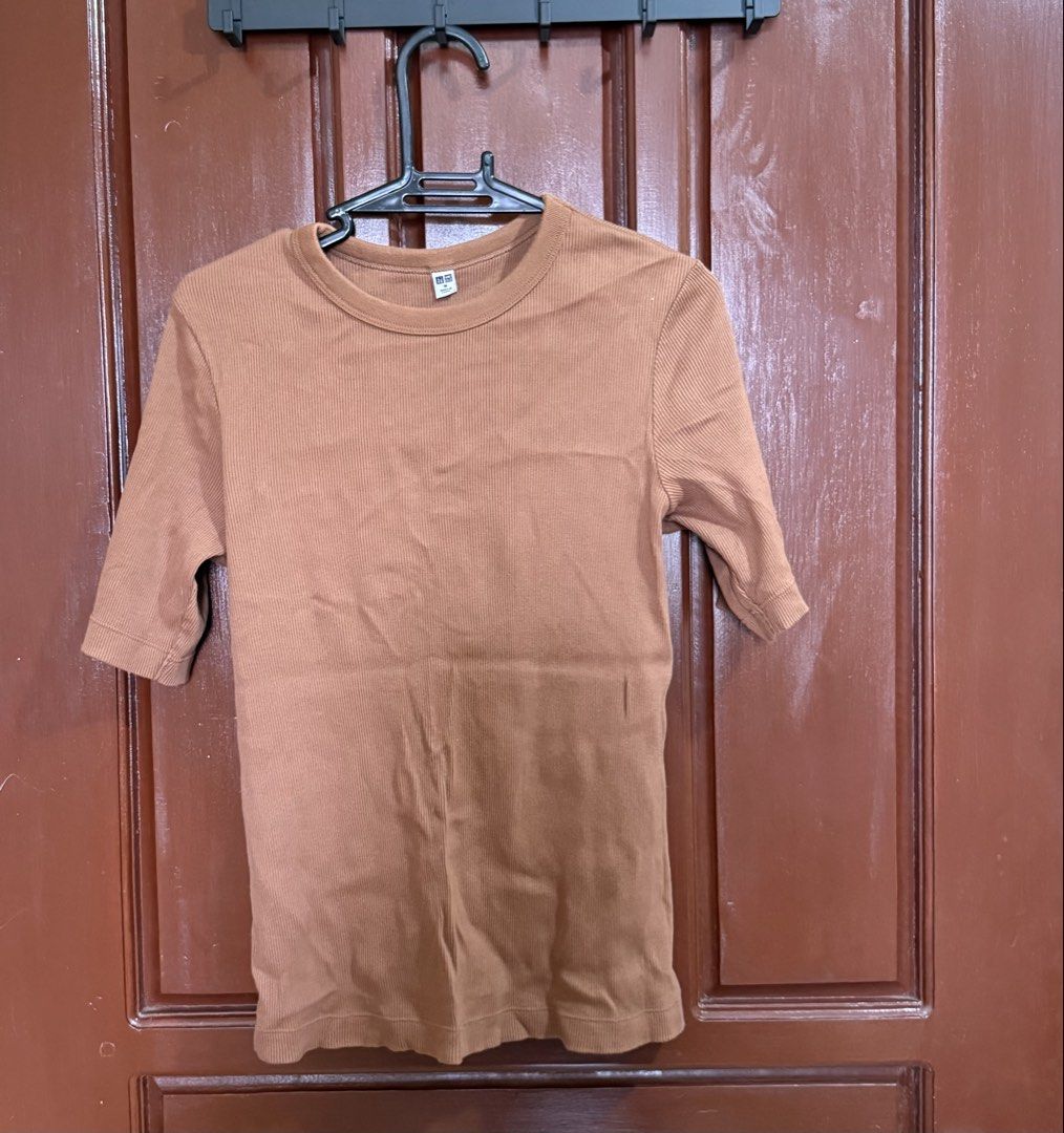 Uniqlo Ribbed Half Sleeve T-Shirts MEDIUM (Category: Shirts) located in Marikina City. Submitted by wearism (Listing ID 1464004165, Image 1). Description: 100% original Uniqlo. Slightly used. Not from UKAY. AVAILABLE UNTIL POSTED. Size: Medium (W12.5”xL17”) Color: Green (lighter shade) and brown (darker shade) Fit: Regular Where was it made: China Price is fixed. Php250.00 each No additional photos will be provided. No when worn photo. We will se