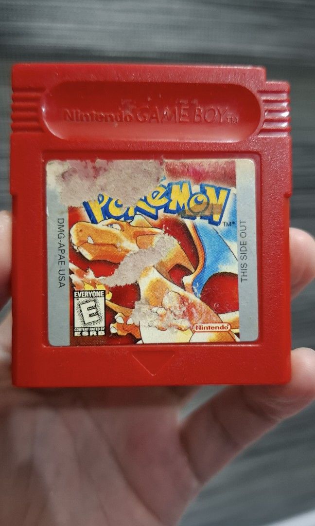 US Pokemon Red with cartridge case protector. (Category: Nintendo) located in San Juan City. Submitted by ricsgaragesale (Listing ID 1464903559, Image 3). Description: Pokemon Red Price: 2,700 PHP - Authentic. - Tested and working. - US version. - Good board condition. - New battery installed for save function. - With original cartridge case protector Issues: Scratches and bad label condition. Note: All items are clean before posting and selling 
