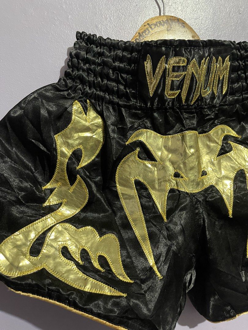 VENUM Muay Thai Shorts (Category: Shorts) located in Angeles City. Submitted by andreiboughts (Listing ID 1464866011, Image 2). Description: Length: 14 Waist: 22-30 Condition: 9/10 Color rate: 9/10 Issue (s): sign of usage on design Complete Tags ✅ Medium on tag.