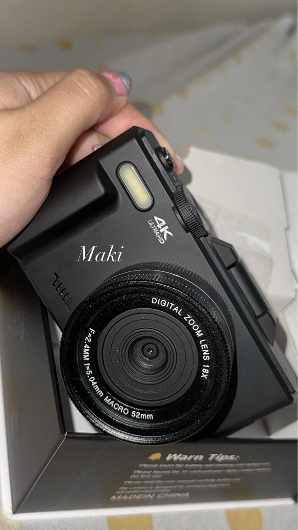 Vetek 8 Digital Camera Pro (Category: Cameras) located in Manila. Submitted by jichuness (Listing ID 1464790976, Image 1). Description: - Color: Sleek Black - Resolution: Up to 64M photos, 4K video - Features: Flip-up screen, 18x digital zoom, great for vlogs - Inclusions: Beaded wrist strap with black heart charms, grey drawstring pouch, original box, and lens cap - Condition: Brand new in box, easy to use 📍sampaloc manila.