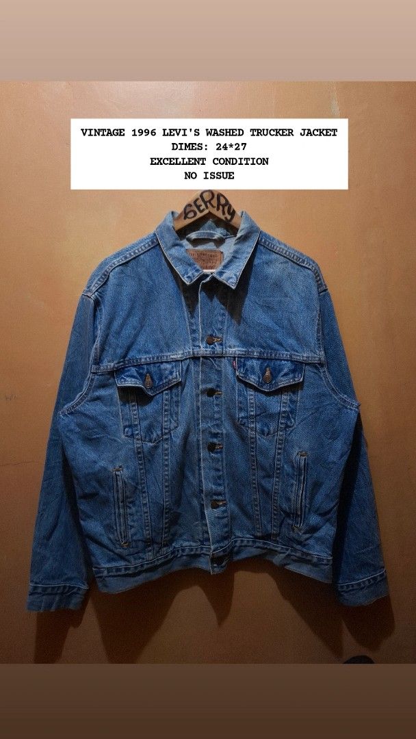 Vintage 1996 Levi's Washed Trucker Jacket (Category: Coats, Jackets and Outerwear) located in Manila. Submitted by bonaobrag55538 (Listing ID 1464844315, Image 1). Description: - Vintage 1996 Levi's washed trucker jacket, proudly Made in USA - Classic mid-blue wash with traditional metal shank buttons - Features dual chest pockets with red tab and convenient side pockets - Authentic leather patch at the back collar - Measurements: 24 inches pit t