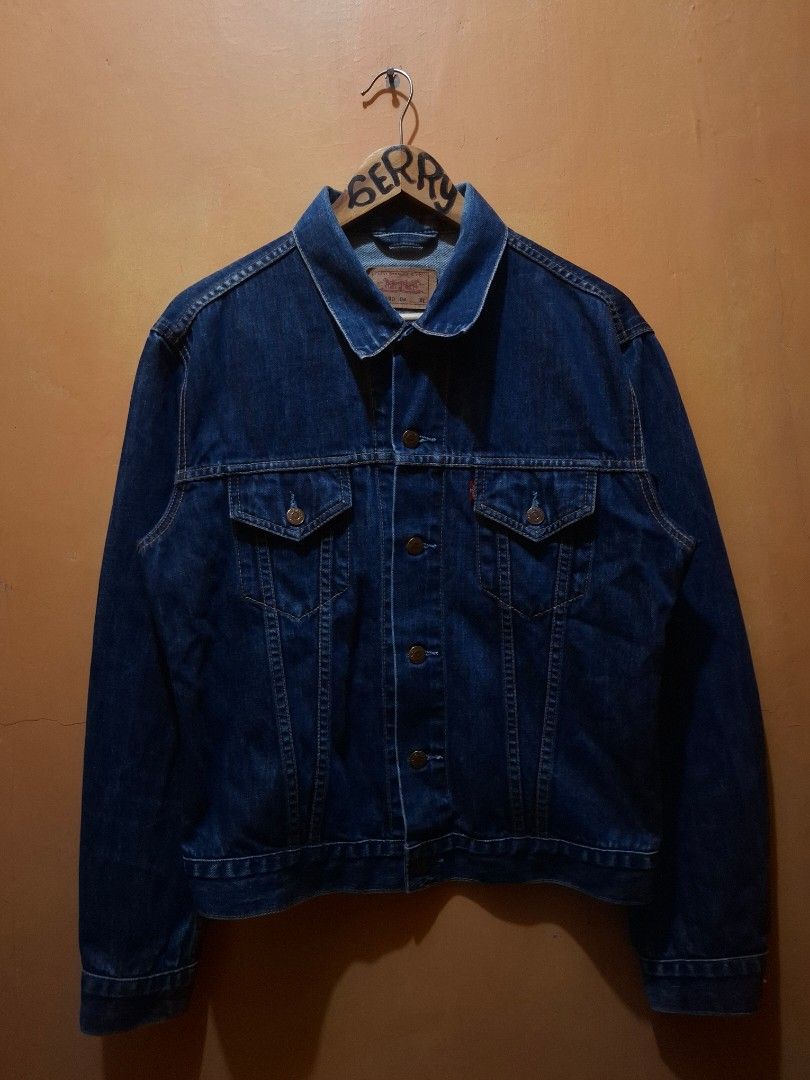 Vintage 2002 Levi's Type 3 Trucker Jacket (Category: Coats, Jackets and Outerwear) located in Manila. Submitted by bonaobrag55538 (Listing ID 1464843594, Image 2). Description: - Brand: Levi's - Style: Vintage 2002 Type 3 Denim Jacket - Wash: Dark wash - Size: XL but fit to medium - Measurements: 21 inches across the chest, 25.5 inches in length - Details: Classic button-up front, dual chest pockets, iconic red tab - Condition: Excellent vintage 