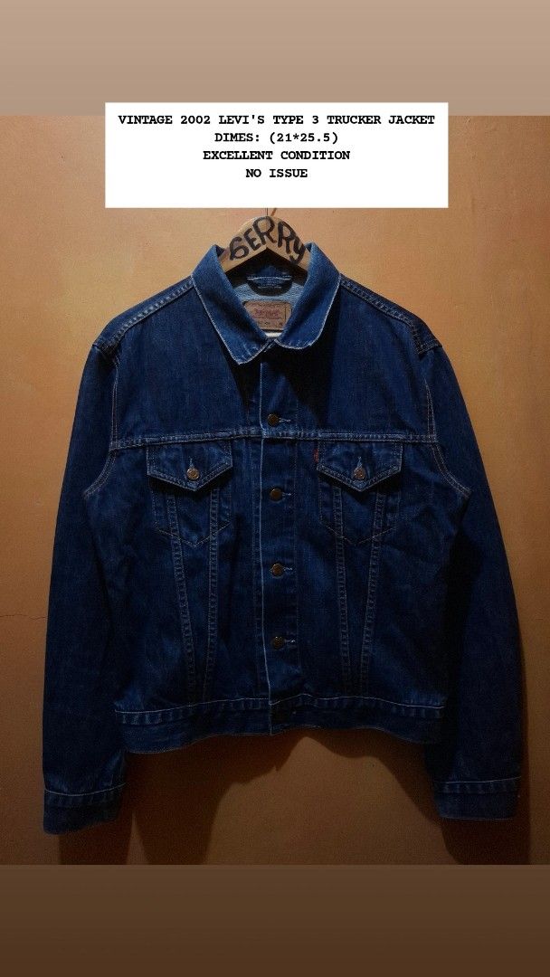 Vintage 2002 Levi's Type 3 Trucker Jacket (Category: Coats, Jackets and Outerwear) located in Manila. Submitted by bonaobrag55538 (Listing ID 1464843594, Image 1). Description: - Brand: Levi's - Style: Vintage 2002 Type 3 Denim Jacket - Wash: Dark wash - Size: XL but fit to medium - Measurements: 21 inches across the chest, 25.5 inches in length - Details: Classic button-up front, dual chest pockets, iconic red tab - Condition: Excellent vintage 