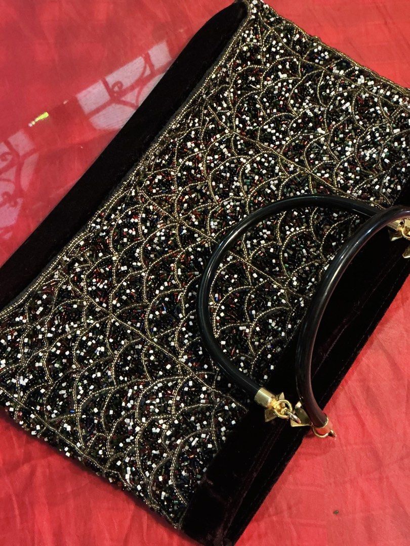 Vintage Beaded Handbag (Category: Purses & Pouches) located in Manila. Submitted by harpymonetttt (Listing ID 1464809595, Image 3). Description: - Elegant black handbag with intricate beaded pattern - Chic round top handle accented with stylish gold hardware - Secure zipper top closure to keep your essentials safe - Spacious interior with plenty of room for your party must-haves - Perfect statement accessory for dinners, parties, and formal event
