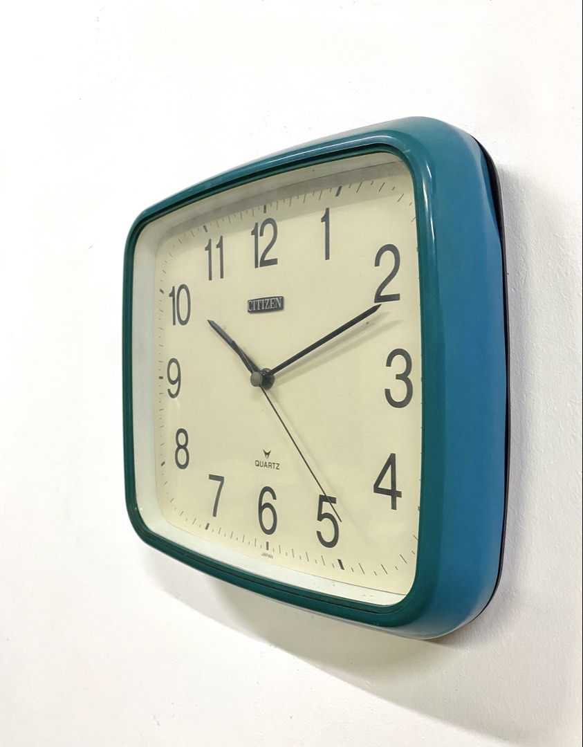 Vintage Citizen quartz wall clock teal green square (Category: Clocks) located in Santa Rosa. Submitted by annie_annie83 (Listing ID 1464874299, Image 3). Description: - Brand/Model: Citizen wall clock - Movement: Japanese quartz movement (battery-operated) - Design: Teal green chunky retro plastic frame with off-white dial, large black numbers, and clear minute tracks - Condition: Clean face and working great - Best for: Kitchen, office, or livi