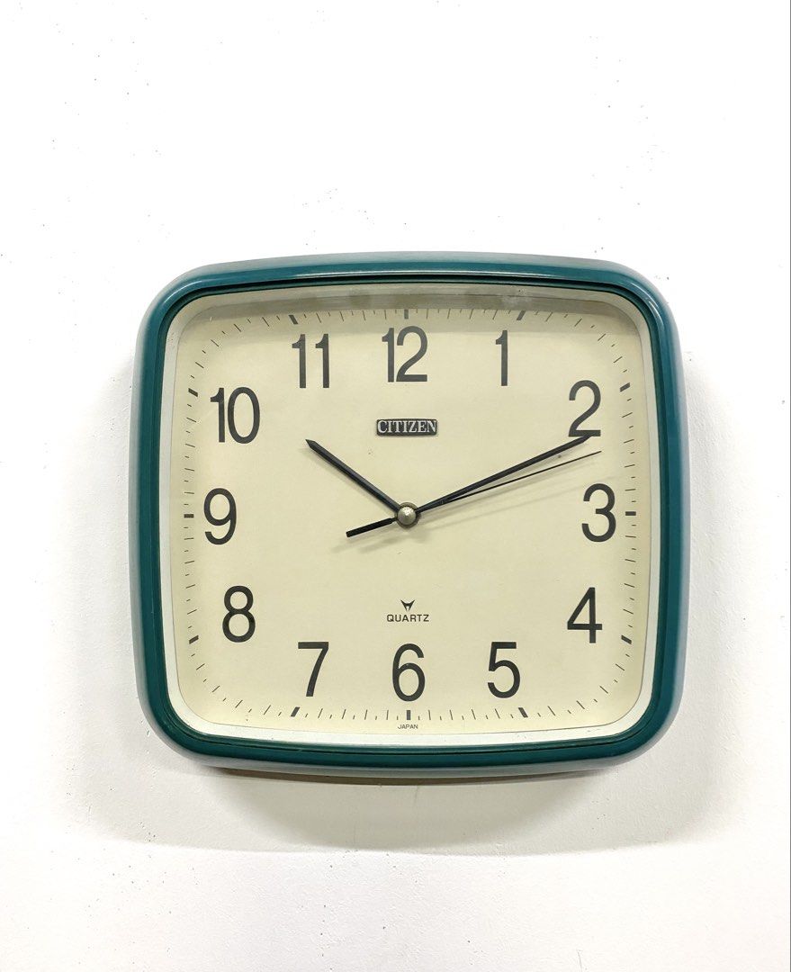 Vintage Citizen quartz wall clock teal green square (Category: Clocks) located in Santa Rosa. Submitted by annie_annie83 (Listing ID 1464874299, Image 1). Description: - Brand/Model: Citizen wall clock - Movement: Japanese quartz movement (battery-operated) - Design: Teal green chunky retro plastic frame with off-white dial, large black numbers, and clear minute tracks - Condition: Clean face and working great - Best for: Kitchen, office, or livi