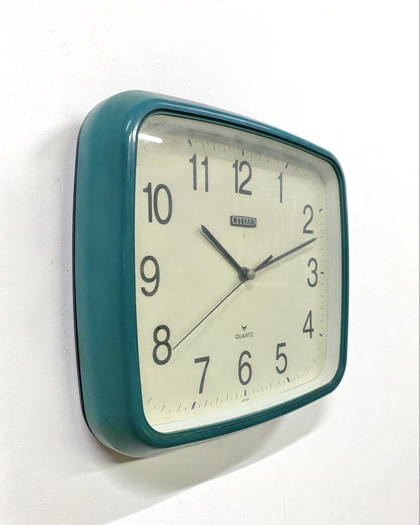 Vintage Citizen quartz wall clock teal green square (Category: Clocks) located in Santa Rosa. Submitted by annie_annie83 (Listing ID 1464874299, Image 2). Description: - Brand/Model: Citizen wall clock - Movement: Japanese quartz movement (battery-operated) - Design: Teal green chunky retro plastic frame with off-white dial, large black numbers, and clear minute tracks - Condition: Clean face and working great - Best for: Kitchen, office, or livi