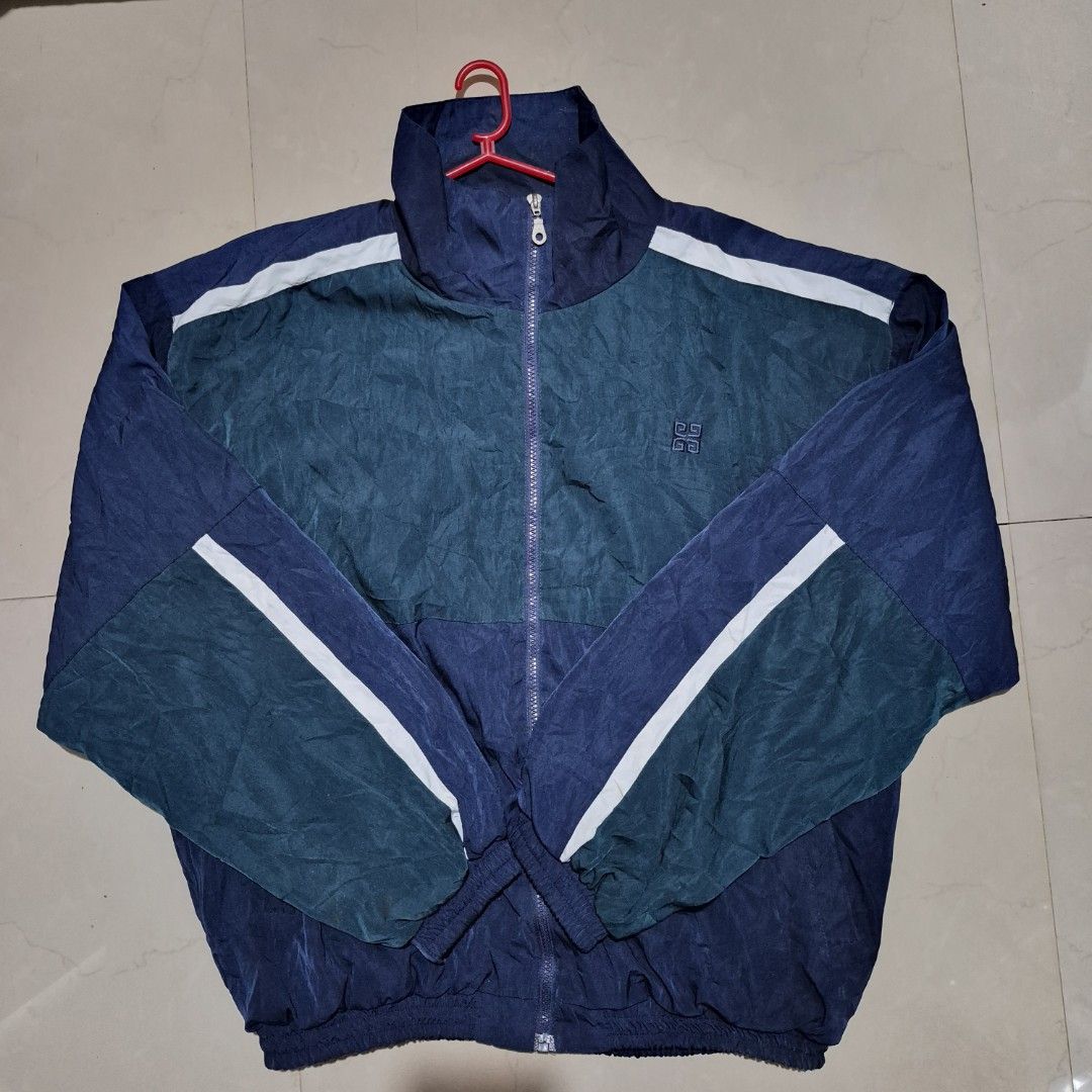 Vintage Givenchy Windbreaker (Category: Coats, Jackets and Outerwear) located in Noveleta. Submitted by nep21 (Listing ID 1464816639, Image 1). Description: Vintagr Givenchy Windbreaker Size XL Very good condition 2,000 pesos Noveleta,Cavite location Shipping J&T or Lalamove.