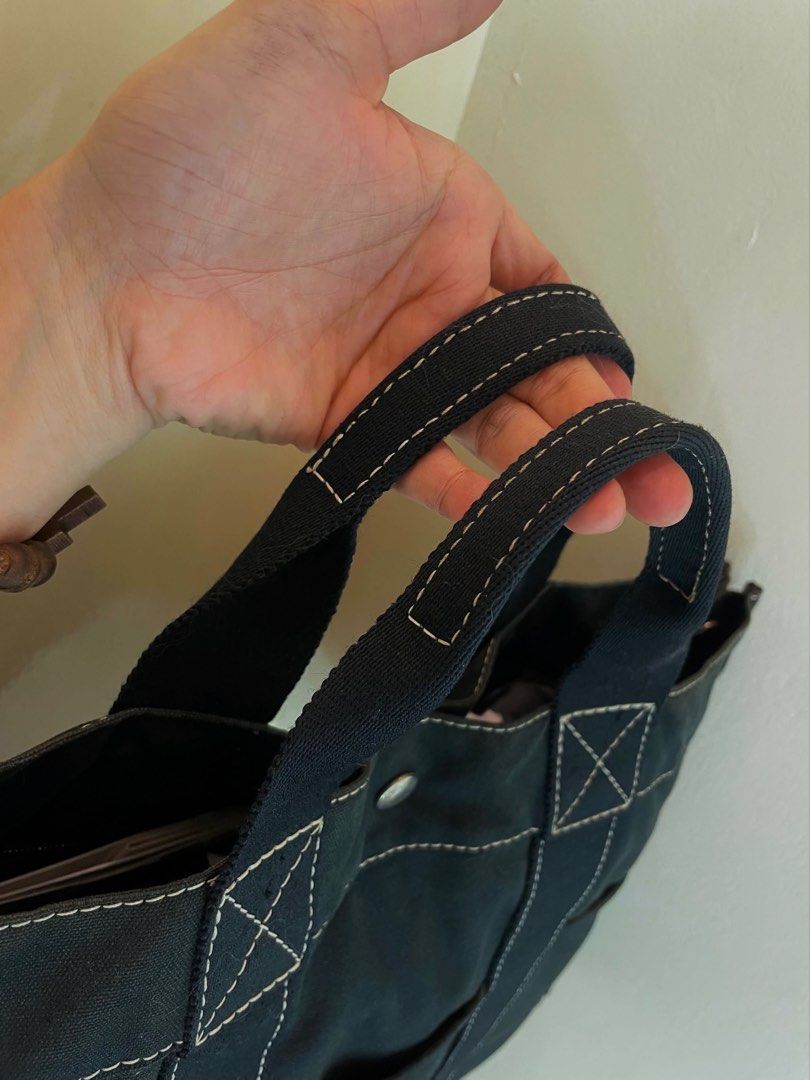 Vintage Hermès Canvas Tote (Category: Luxury Bags & Wallets) located in Manila. Submitted by thevintagebow (Listing ID 1464967383, Image 2). Description: Quiet luxury on a budget? Say less.✨ This vintage Hermès Fourre-Tout MM in black canvas is a proof that simplicity never goes out of style. The crisp white stitching gives it that clean, elevated look, while the durable canvas and roomy design mean you can carry your life in it effortlessly! Pri