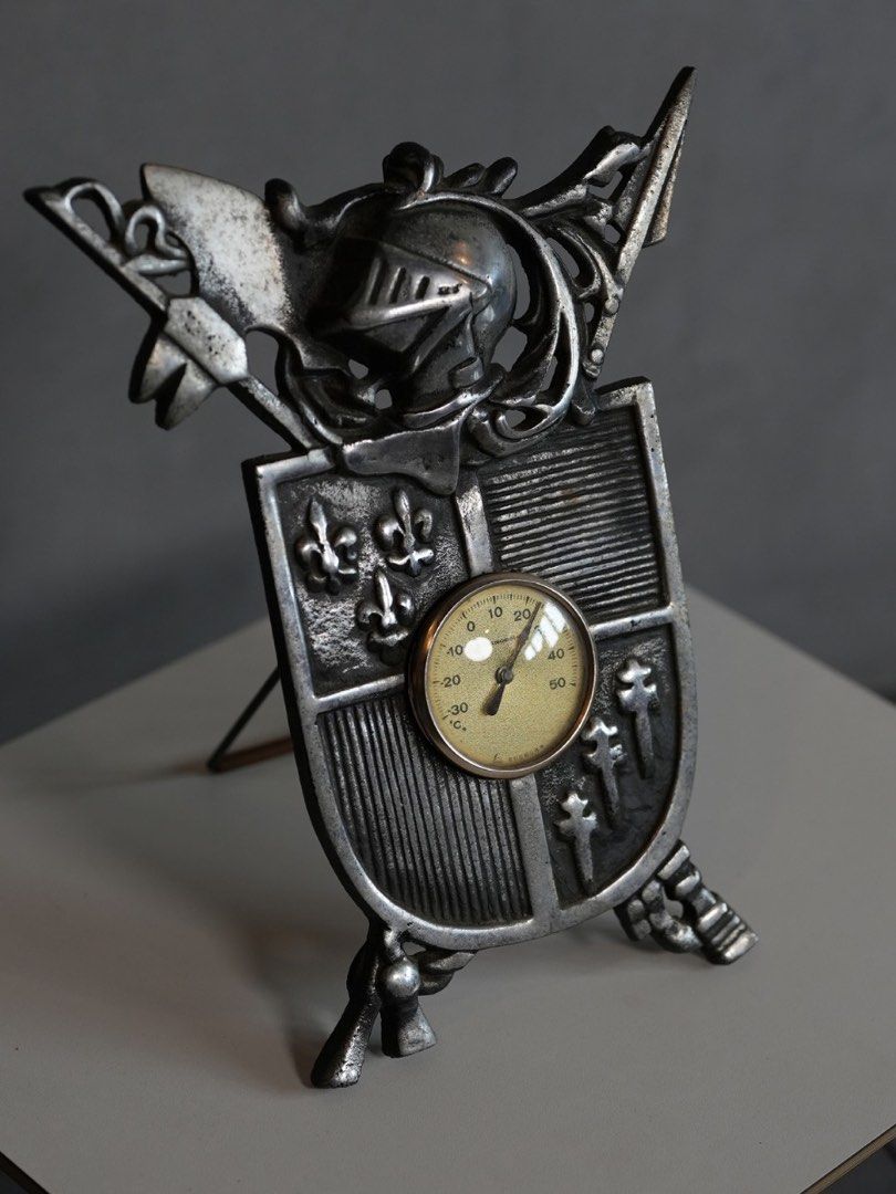 Vintage Knight Shield Thermometer Desk Decor (Category: Vintage Collectibles) located in San Fernando. Submitted by recalibrate.furniture (Listing ID 1464839808, Image 2). Description: CAST METAL MEDIEVAL THERMOSTAT Best for home decor. Thermostat feature needs repair to function. L: 23cm H: 30cm Asking is 1.8k only. 𝘿𝙄𝙎𝘾𝙇𝘼𝙄𝙈𝙀𝙍: 𝘈𝘭𝘭 𝘰𝘶𝘳 𝘷𝘪𝘯𝘵𝘢𝘨𝘦 𝘱𝘪𝘦𝘤𝘦𝘴 𝘩𝘢𝘷𝘦 𝘭𝘪𝘷𝘦𝘥 𝘢 𝘱𝘳𝘦𝘷𝘪𝘰𝘶𝘴 𝘭𝘪𝘧𝘦 𝘢𝘯𝘥 𝘮𝘢𝘺 𝘴𝘩