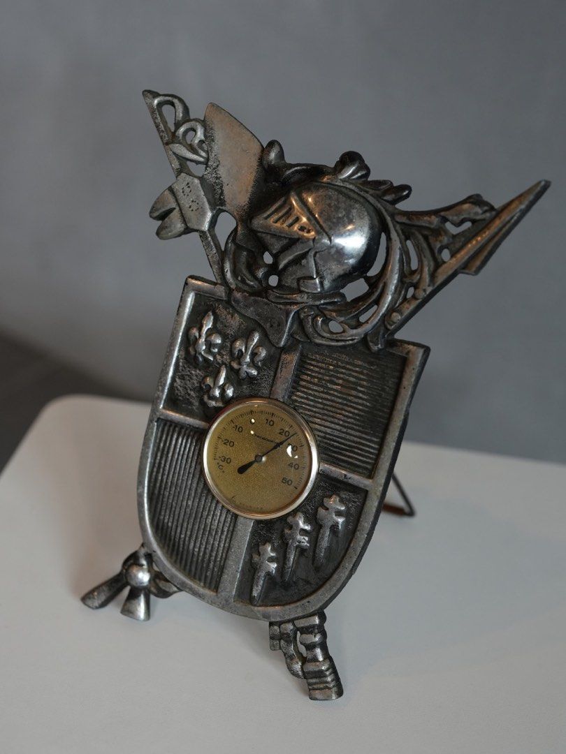 Vintage Knight Shield Thermometer Desk Decor (Category: Vintage Collectibles) located in San Fernando. Submitted by recalibrate.furniture (Listing ID 1464839808, Image 3). Description: CAST METAL MEDIEVAL THERMOSTAT Best for home decor. Thermostat feature needs repair to function. L: 23cm H: 30cm Asking is 1.8k only. 𝘿𝙄𝙎𝘾𝙇𝘼𝙄𝙈𝙀𝙍: 𝘈𝘭𝘭 𝘰𝘶𝘳 𝘷𝘪𝘯𝘵𝘢𝘨𝘦 𝘱𝘪𝘦𝘤𝘦𝘴 𝘩𝘢𝘷𝘦 𝘭𝘪𝘷𝘦𝘥 𝘢 𝘱𝘳𝘦𝘷𝘪𝘰𝘶𝘴 𝘭𝘪𝘧𝘦 𝘢𝘯𝘥 𝘮𝘢𝘺 𝘴𝘩