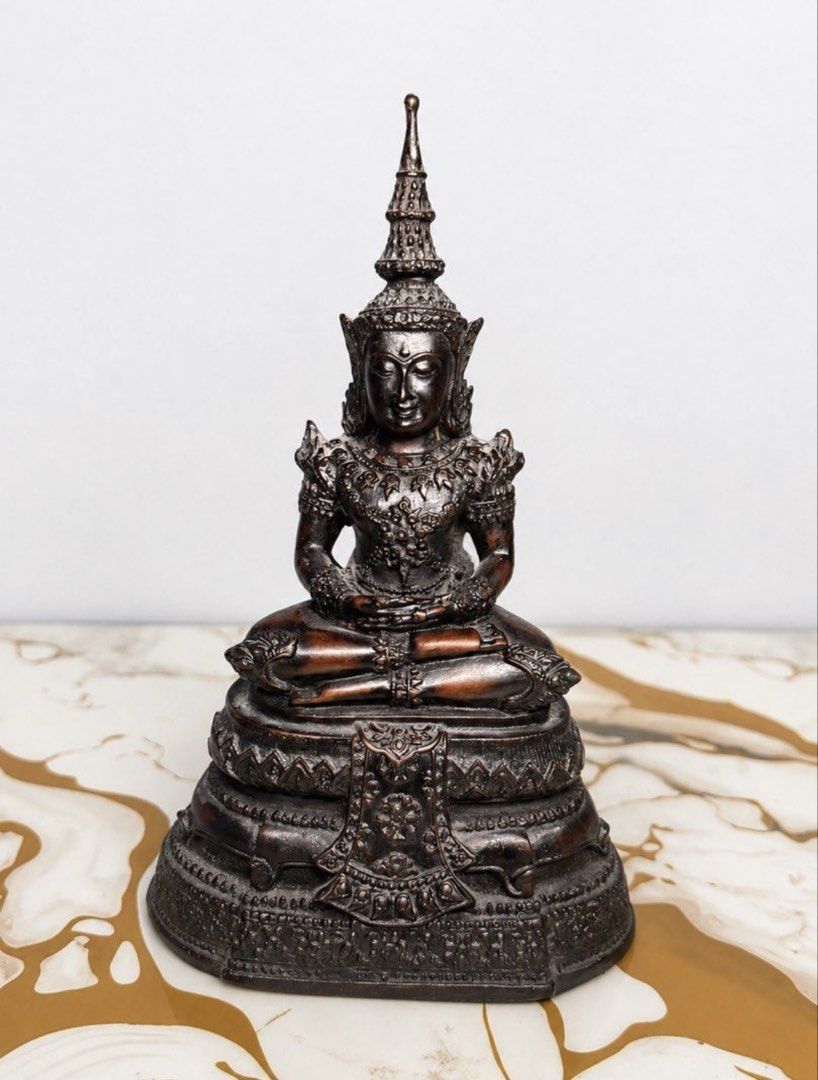 Vintage Metal Buddha Statue (Category: Religious Items) located in Makati City. Submitted by annelipse0003 (Listing ID 1464792168, Image 1). Description: TAKE ALL FOR 4000 pesos only! - Ornate metal Buddha statue in lotus position - Detailed robes, crown, and intricate base patterns - Rich dark patina with subtle copper highlights - Solid and heavy build for premium quality - Ideal decor for shelves, altars, or living room tables.