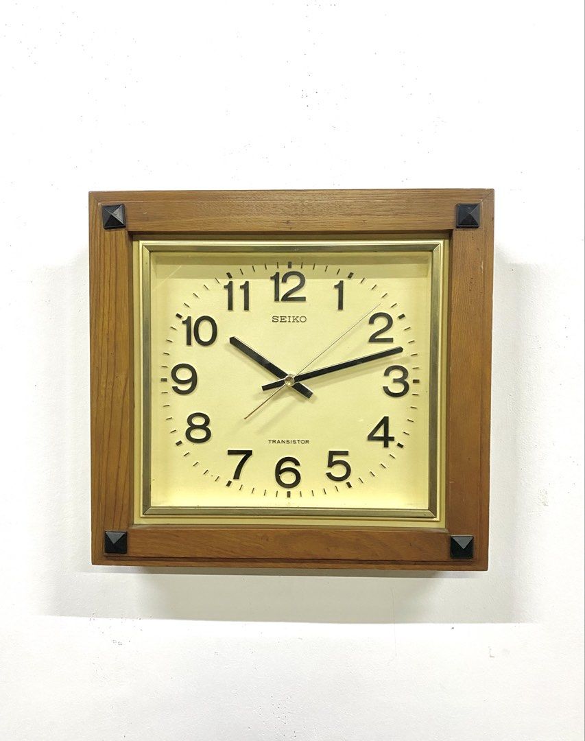 Vintage Seiko Transistor Wood Wall Clock (Category: Clocks) located in Santa Rosa. Submitted by annie_annie83 (Listing ID 1464873853, Image 1). Description: - Vintage Seiko Transistor wall clock - Classic wooden frame with stylish black pyramid corner accents - Off-white square dial with black Arabic numerals and gold-toned bezel - Clean and fully working mechanism - Battery-operated (takes standard batteries) - Condition: Minor wear along the wo