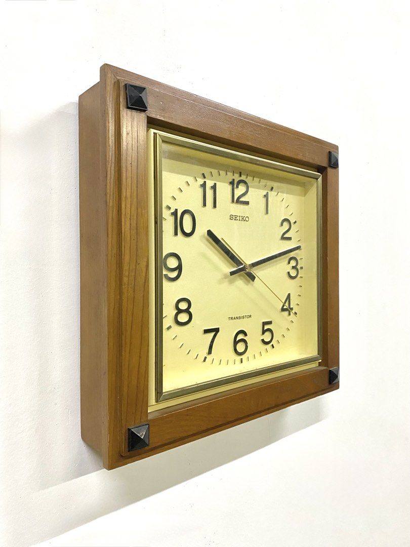 Vintage Seiko Transistor Wood Wall Clock (Category: Clocks) located in Santa Rosa. Submitted by annie_annie83 (Listing ID 1464873853, Image 3). Description: - Vintage Seiko Transistor wall clock - Classic wooden frame with stylish black pyramid corner accents - Off-white square dial with black Arabic numerals and gold-toned bezel - Clean and fully working mechanism - Battery-operated (takes standard batteries) - Condition: Minor wear along the wo
