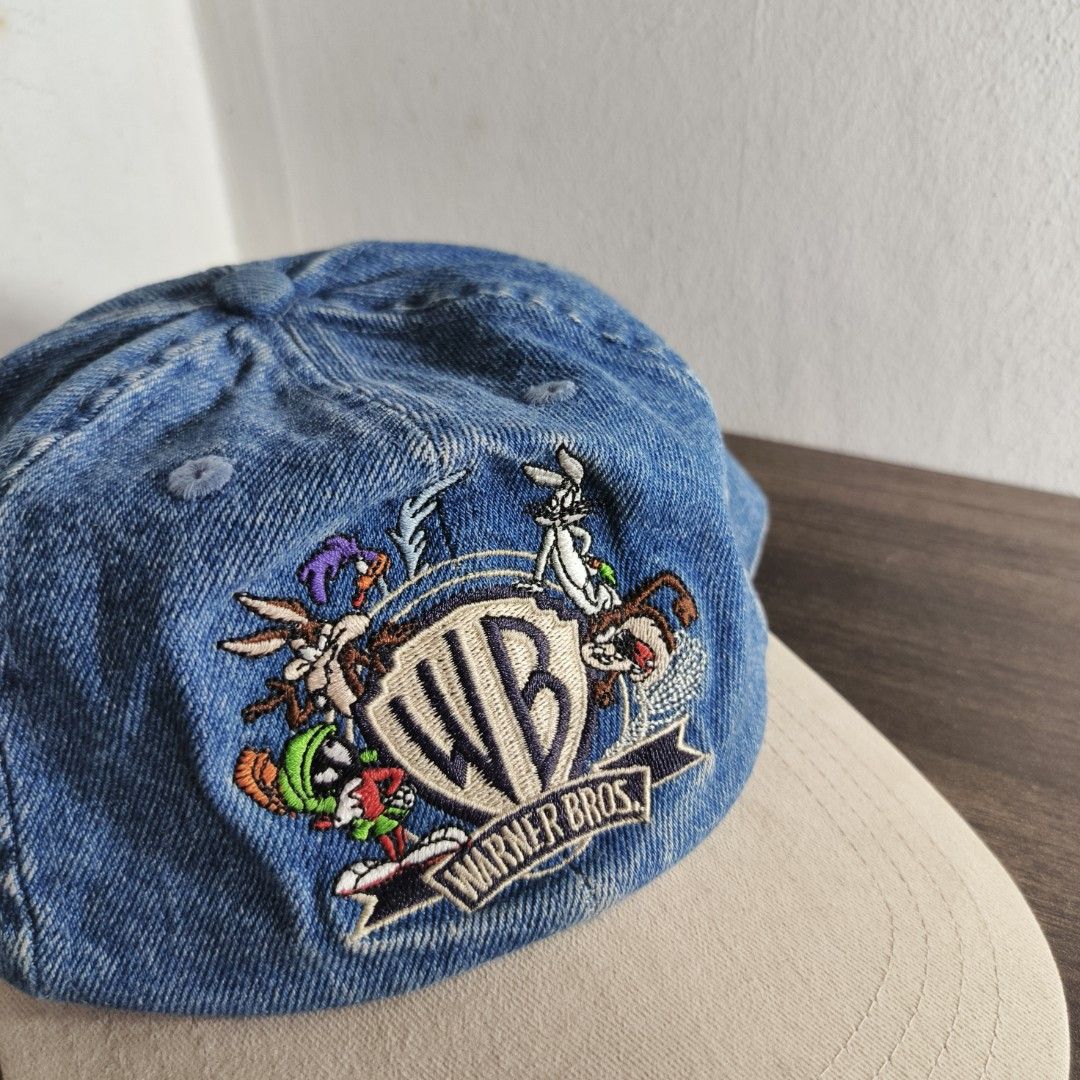 Vintage Warner Bros. Studio Denim Cap (Category: Babies & Kids Fashion) located in Antipolo. Submitted by soon2byours_ (Listing ID 1464792308, Image 2). Description: Youth Fitting Elastic Back One Size Circumference: 21½" Flaws: sign of usage, stretched elastic, & stains Color Rate: 9/10 Condition: GOOD.
