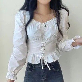 Vintage White Bustier Corset Puff (Category: Longsleeves) located in Binan City. Submitted by myprelovedhaul (Listing ID 1464925679, Image 1). Description: This chic white milkmaid blouse features an eye-catching front lace-up corset detail and a classic square neckline..