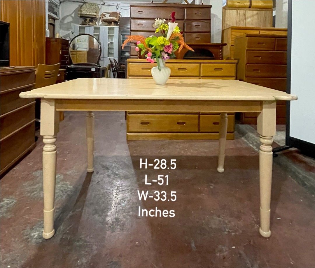 Vintage Wooden Dining Table (Category: Tables & Sets) located in Quezon City. Submitted by dannikkishoppe2 (Listing ID 1464879277, Image 2). Description: Vintage Wooden Dining Table ‼️₱5000‼️ • Cream-painted wooden dining table featuring classic turned legs and elegant scalloped corner edges • Dimensions: L51 W33.5 H28.5 inches • Solid, sturdy build ensuring long-lasting durability • Condition: Minor surface wear on the tabletop, still looks love