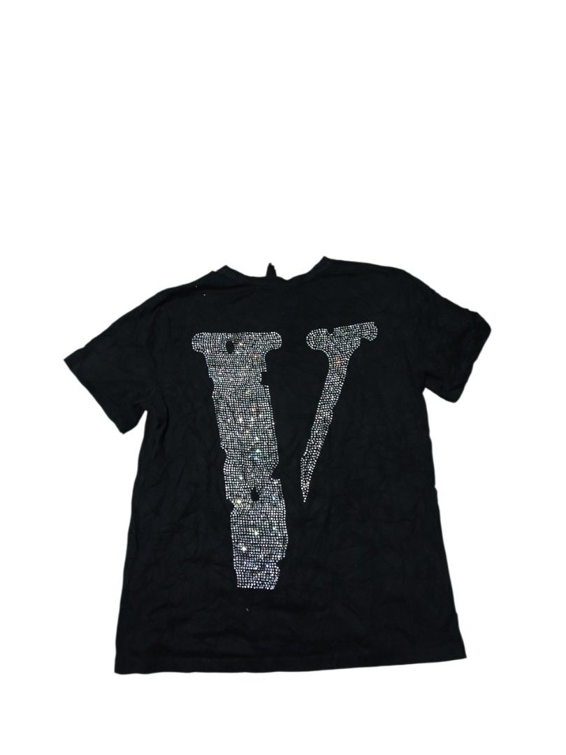 Vlone x swarovski (Category: Tshirts & Polo Shirts ) located in San Jose. Submitted by garments17 (Listing ID 1464900082, Image 2). Description: - Brand: Vlone - Color: Solid black - Design: Front spells "FRIENDS-" in rhinestones, back features the iconic large V logo fully encrusted in rhinestones - Fit: Standard fit with short sleeves and classic crew neck - Style: Eye-catching bling streetwear statement piece.