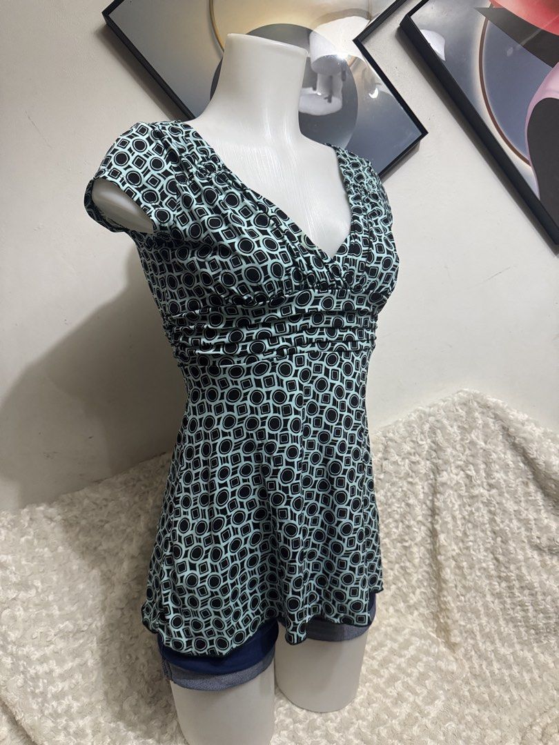 Vol.1 Geometric Pattern V-Neck Short Sleeve Top (Category: Blouses) located in Marikina City. Submitted by lorradel (Listing ID 1464903384, Image 2). Description: Vol.1 brand top with a teal and black geometric pattern all over. V-neck cut, ruched front bodice, short sleeves. Back has a matching fabric tie closure at the waist. Stretchy fabric, super comfortable fit. Great casual piece for daily wear. - MAY HAVE some washable stains (hindi maiiwa