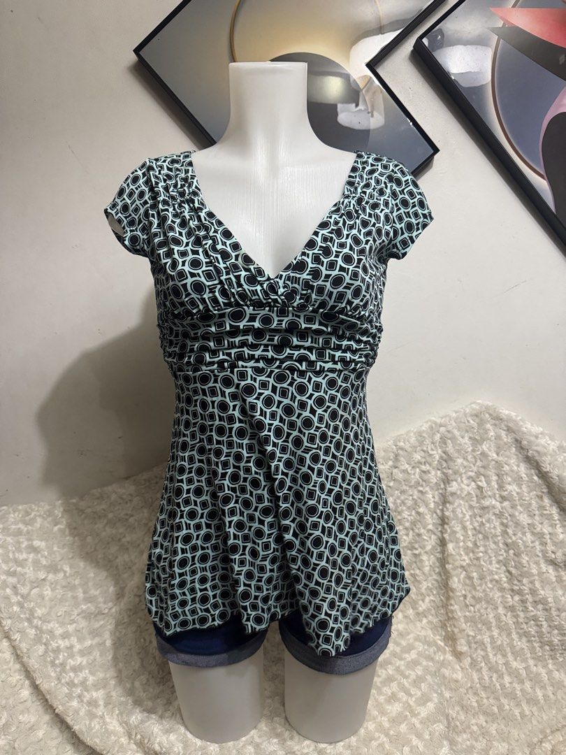 Vol.1 Geometric Pattern V-Neck Short Sleeve Top (Category: Blouses) located in Marikina City. Submitted by lorradel (Listing ID 1464903384, Image 1). Description: Vol.1 brand top with a teal and black geometric pattern all over. V-neck cut, ruched front bodice, short sleeves. Back has a matching fabric tie closure at the waist. Stretchy fabric, super comfortable fit. Great casual piece for daily wear. - MAY HAVE some washable stains (hindi maiiwa