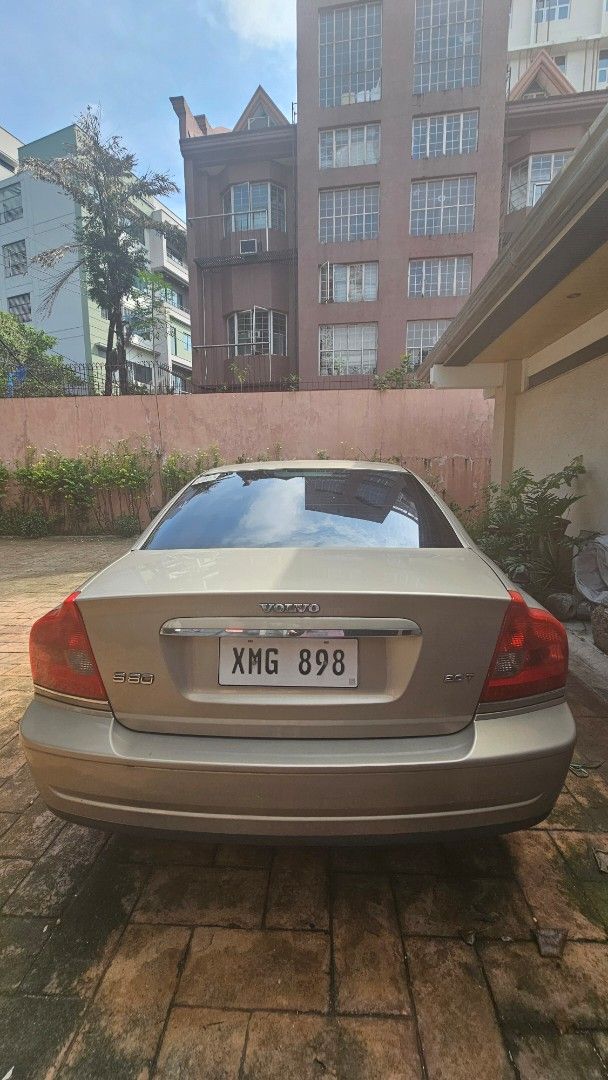 Volvo S80 2.5T (A) (Category: Used Cars) located in Quezon City. Submitted by dmrtea (Listing ID 1464781074, Image 2). Description: Model: Volvo S80 2004 Year Bought: Sept 2004 Color: Gold 2026 registered, new tires, ongoing insurance Mileage: 24,019 Female Driver well maintained, used for city drive only, 1st owner. Reason for selling: upgrade Issues: nothing major, some aging and microcracks on the leather seat, need airbag replacement (cannot 