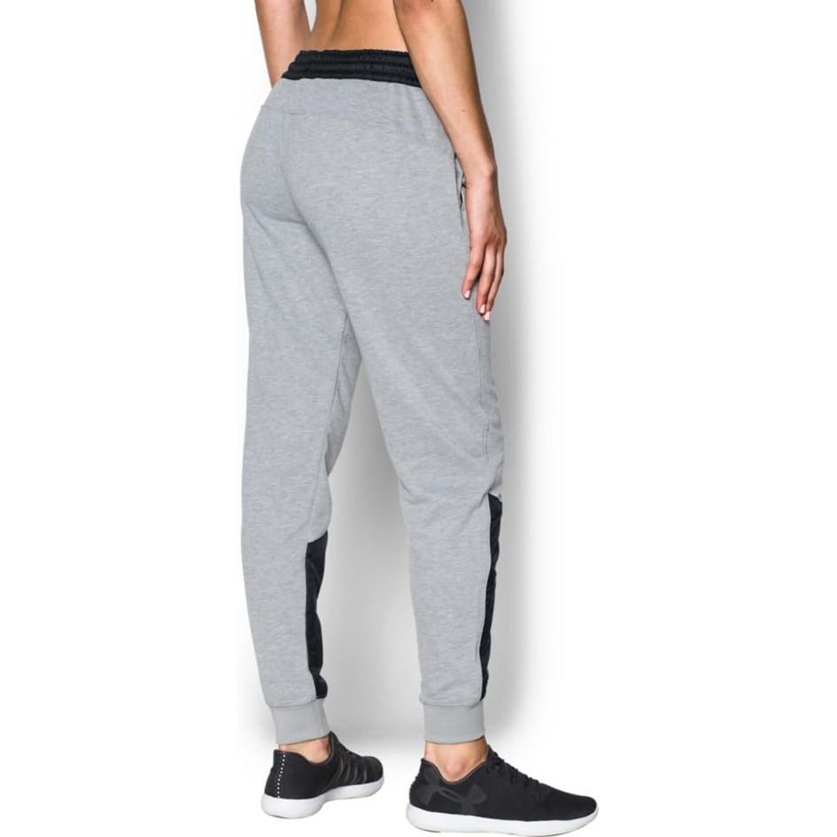 (W:30) Authentic Under Armour Joggers Grey Black Sweatpants (Category: Other Bottoms) located in Imus. Submitted by alfa_8 (Listing ID 1464856865, Image 2). Description: Gorpcore / Sporty / Streetwear / Athleisure Condition: 9/10 (Great pre-loved condition, please manage expectations) Color: Heather Grey body accented with a solid black waistband and matching black knee-to-calf panels. Authentic Under Armour joggers featuring a comfortable tapere