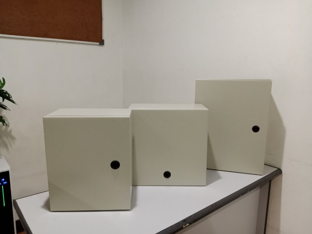 Wall Mounting Metal Enclosure (Category: Construction & Building Materials) located in Manila. Submitted by cyrenejoye (Listing ID 1464810851, Image 3). Description: - Brand new metal enclosure box in original packaging - Durable beige finish with a solid, heavy-duty build - Hinged door equipped with a secure locking latch and weather-resistant rubber seal - Includes internal mounting plate and complete hardware bag - Ideal for secure electrical 